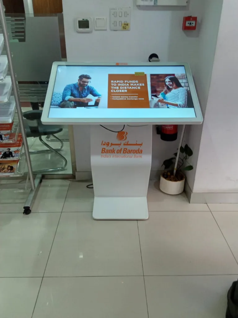 White interactive LCD screen showing man and woman visual
