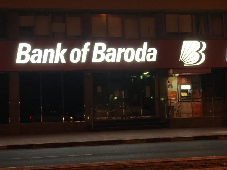 Illuminated Bank of Baroda 3D signage at night