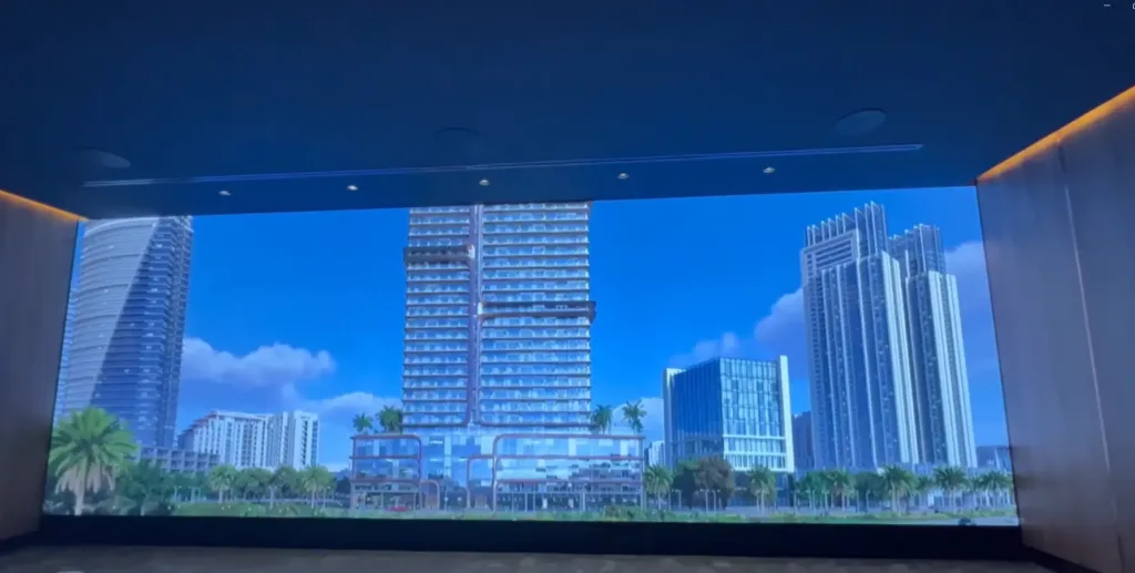 Spacious room with LED wall screen displaying building image