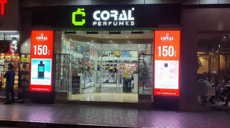 Shop front LED display showing 'Coral' welcoming visitors