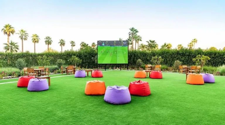 Outdoor LED screen displaying Football match