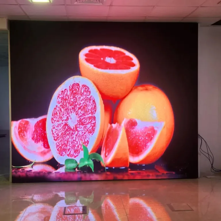 Indoor LED screen displaying arranged grapefruits
