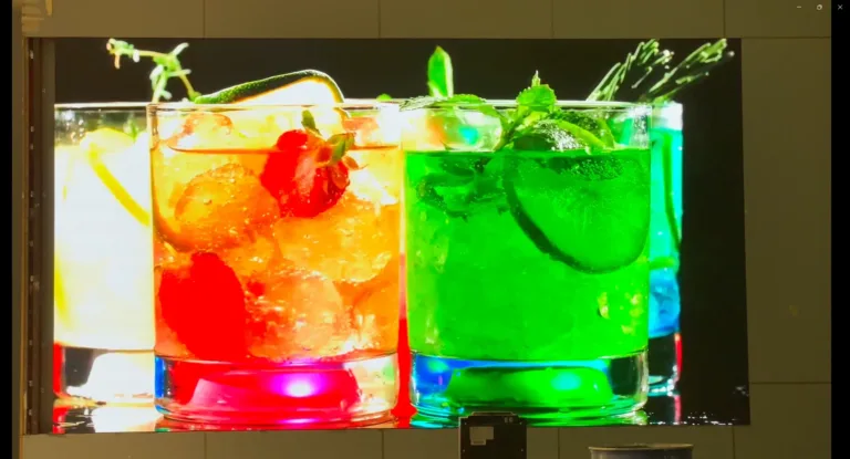 Large LED screen displaying variety of colorful beverages