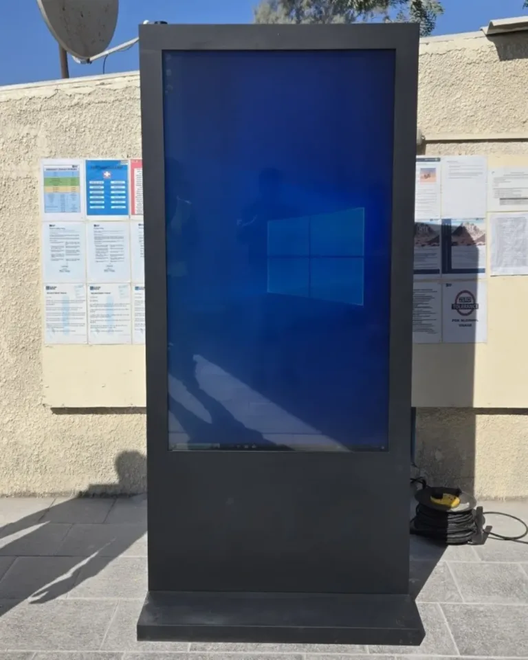 Large LCD screen displaying bright blue visual