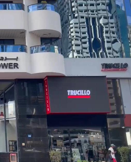 Outdoor LED screen displaying Trucillo advertisement