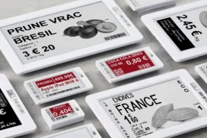 Digital shelf labels showing prices for various food items