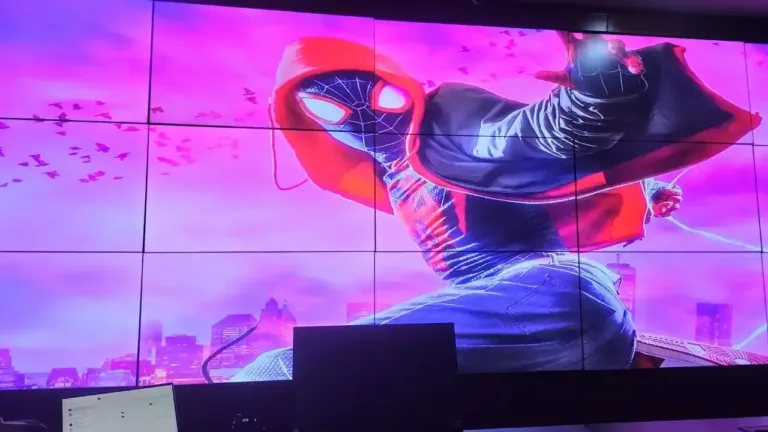 LED advertising screen displaying colorful superhero character visual