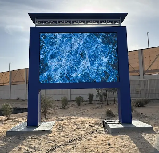 Outdoor LED screen standing in desert landscape