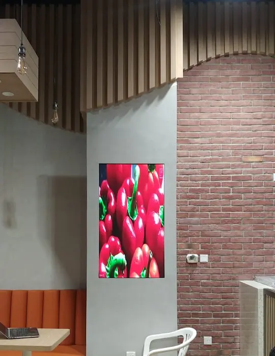 Indoor LED screen displaying vibrant image on wall