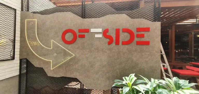 3D signage reading 'Offside'