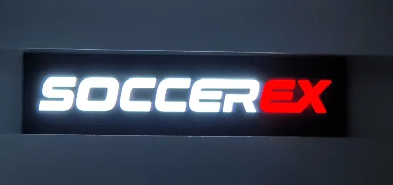 Wall-mounted 3D signage featuring Soccerex logo