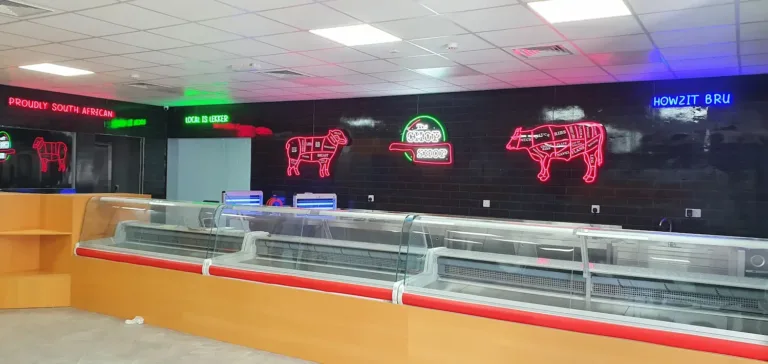 Neon sign with cow design for restaurant decor"