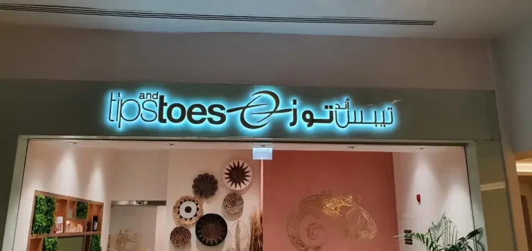 3D sign reading 'Tips and Toes' with modern design