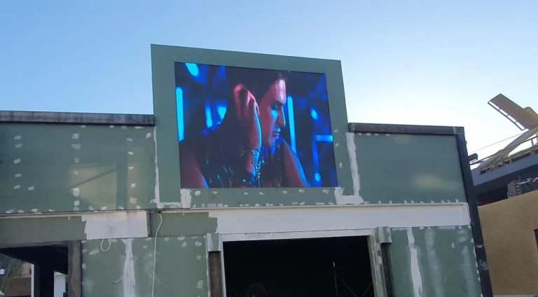 Outdoor LED display board lighting up building front