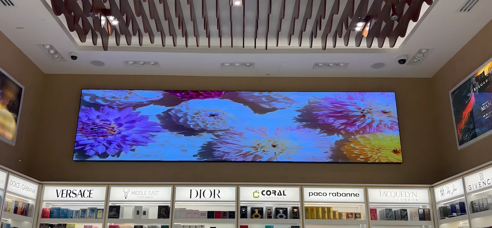 Dgicon LED display screen for perfume store showing floral display