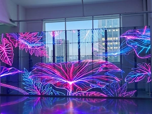 Transparent LED screen displaying colorful plant visuals