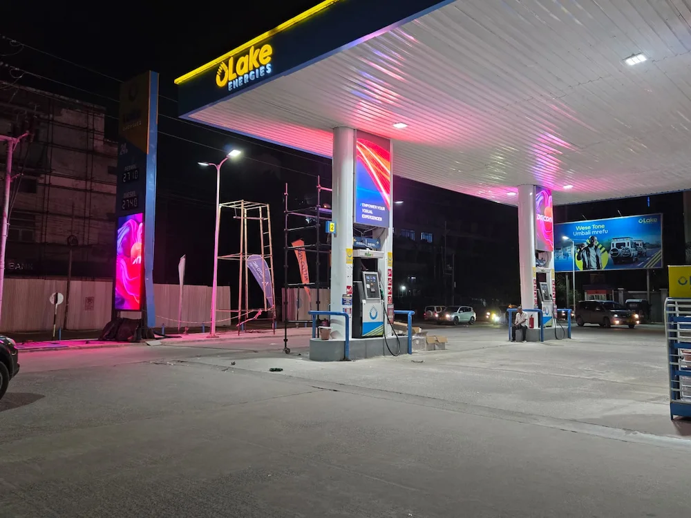 Gas station outdoor LED display screen at night