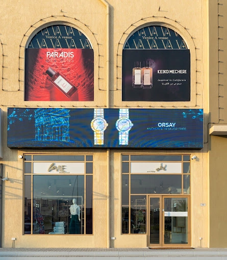 Commercial building with shop LED display on front facade